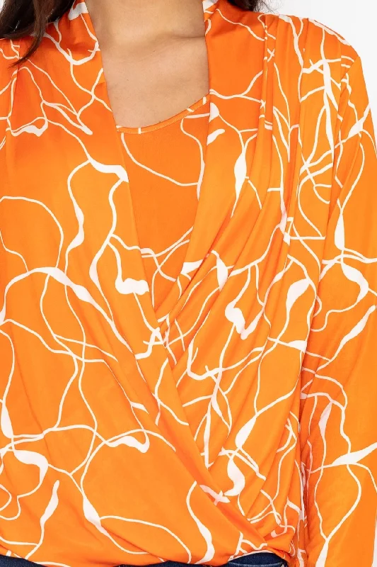 cross-over-top-in-orange-print