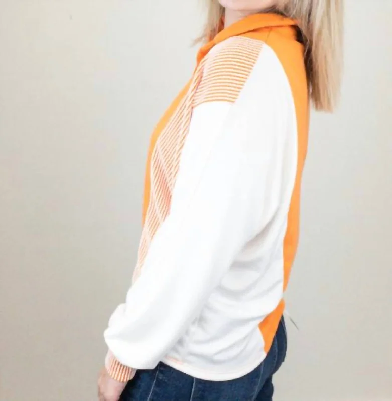 ribbed-pullover-top-in-orange